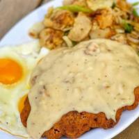 Chicken Fried Steak & Eggs · Served with hash brown or home fries, toast, and jelly.