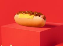 Chili Cheese Dog · A grilled world-famous original hot dog in a fresh, steamed bun with a slice of American che...