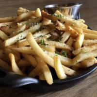 TRUFFLE FRIES · Shoe string Fries flavored with Truffle salt, tossed with Parmesan cheese and comes with gar...