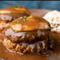 BEEF LOCO MOCO · Loco moco is a dish featured in contemporary Hawaiian cuisine. Served with a side of white r...