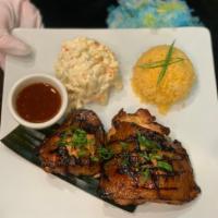 KAMEHAMEHA HULI HULI CHICKEN · Chicken leg, brine in soy garlic and ginger overnight, grilled and served with a side of whi...
