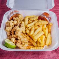 10. Conch and Fish · 1/4 lb. conch 2 pieces fish. Served with fries and coleslaw.