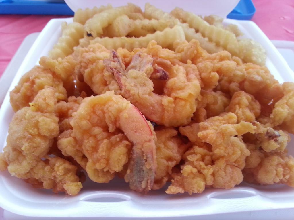 12. Jumbo Shrimp Dinner · 12 jumbo shrimp. Served with fries and coleslaw.