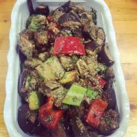6. Eggplant Salad · Oven baked eggplants with red and green bell peppers, balsamic vinegar and virgin olive oil....