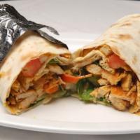 22. Chicken Shwarma · Thinly sliced and marinated chicken. Wrapped in warm lavash bread. Served with lettuce, toma...