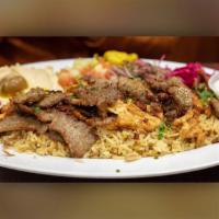 28. Lamb and Beef Shwarma Plate · Slowly cooked and thinly sliced marinated lamb and beef shwarma. Served with homemade bread,...