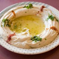 1. Hummus · Garbanzo beans with garlic, lemon juice, tahini and virgin olive oil. Served with warm bread.