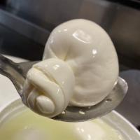 Side of Burrata- · Artisanal hand tied burrata, packed in whey. Perfect compliment to pizza, salad, or beautifu...