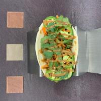 Pork Banh-Mi Taco  · Grilled pork. sliced cucumber. pickled carrot. jalapeños. extra cilantro. hoisin mayo
