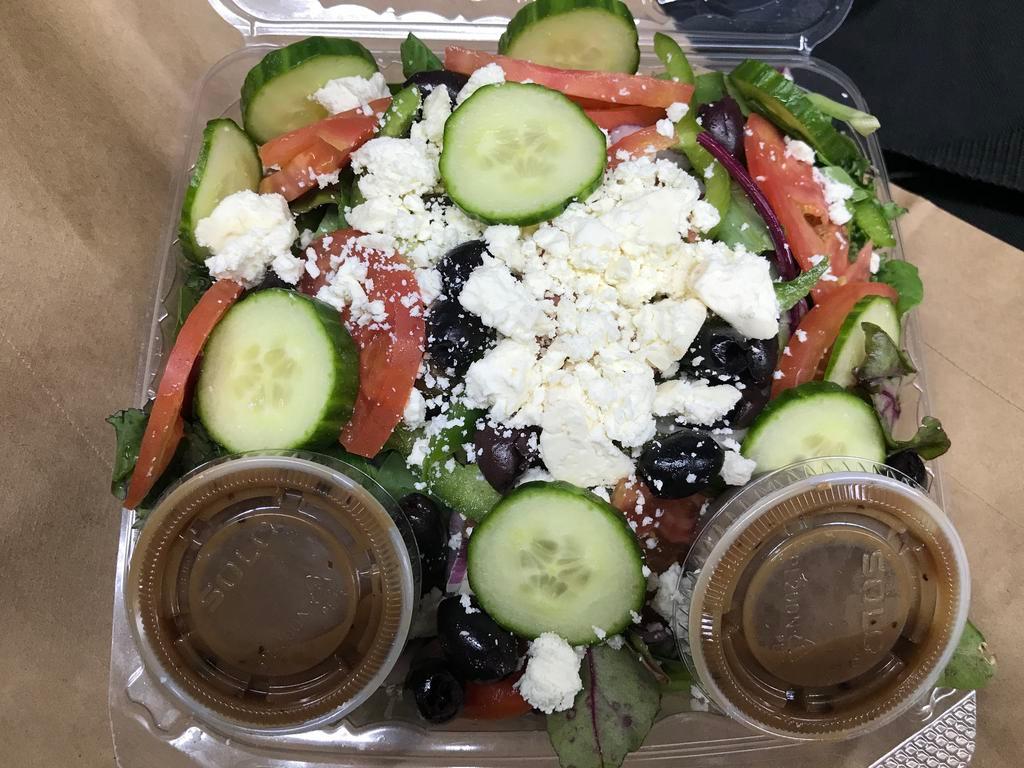 Greek Salad · Mixed greens, tomatoes, red onions, green peppers, Kalamata olives, feta cheese and balsamic vinaigrette.