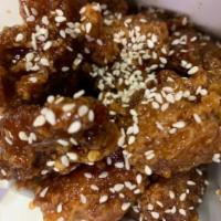 SS11. Sesame Chicken · Spicy large pieces of battered chicken glazed with a sweet brown sauce.