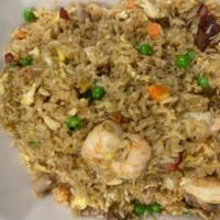 M7. House Special Fried Rice · Wok-fried rice with eggs, peas, carrots, chicken, shrimp, pork and seasonings in a light soy...