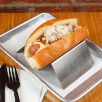 Three Piece Suit Dog · Signature dog topped with Homemade beef Chili, Melted cheese, and chopped onion.
