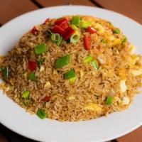 ARROZ CHAUFA · Peruvian fried rice with red bell peppers, scallions, garlic, soy sauce, scrambled eggs, and...