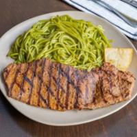 TALLARIN VERDE · Tallarin pasta in a traditional spinach and basil green pesto sauce with a baked golden potato