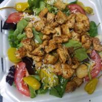 Chicken Salad · Lettuce, cheese, onions, tomatoes, cucumbers, and peppers.