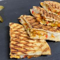Spicy Chicken Panini · Grilled spicy chicken breast with shredded mozzarella cheese and pepper.