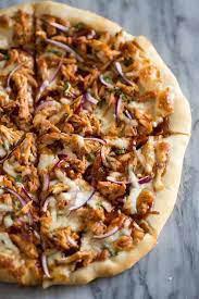 BBQ Chicken Pizza · Oven roasted chicken breast with barbeque sauce, black and green olives and pepper on delici...