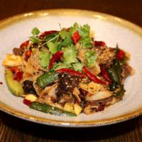 Spicy Pot Fatty Beef (麻辣肥牛香鍋) · Served with fatty beef, beef louver, enoki mushroom, fungus, lotus roots, cucumber, dried to...