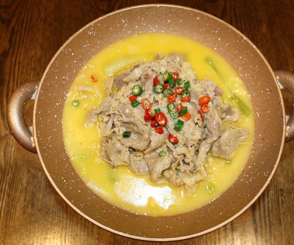 Beef with Golden Pepper Soup 金汤肥牛 · Sliced beef, smashed pumpkins, fresh golden peppers in a soup style 