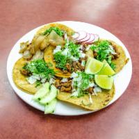 TACOS MIXTOS (MIX OF TACOS) · Soft Nixtamal Corn Tortillas topped with meat (adobada, al pastor, carnitas, chorizo or chic...