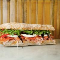 Uncle Jimmy Sandwich · Prosciutto, Hot Sopressata, Smoked Ham,  Fresh Mozzarella, Regina’s Calabrian Chili Spread, ...