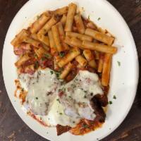 Veal Cutlet Parmigiana · Served with salad, garlic bread and your choice of pasta or french fries.