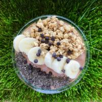 Mud Bowl · Cacao, bananas, almond milk and peanut butter topped with granola, chia seeds almonds and ch...