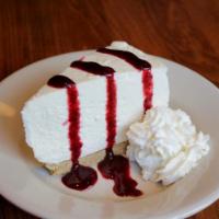 Cheesecake · House made creamy whipped cheesecake with a Graham cracker crust topped with house made nort...