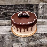 Natalie Cake · Vanilla and chocolate cake is Nutella mousse and cannoli.