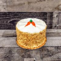Carrot Cake · Carrot cake walnuts, raisins, coconuts, and cream cheese icing.