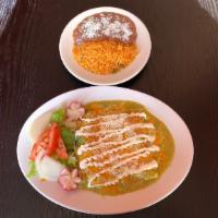 Suizas Enchiladas · Green sauce mixed with sour cream enchiladas. Choice of Beef, chicken or Cheese.