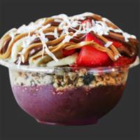 Frutella Bowl · Base: organic acai with banana toppings: granola, banana, strawberry, Nutella, peanut butter...