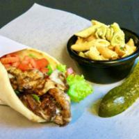 The Pita · Marinated chicken or steak pampered with seasoning, melted provolone with lettuce, tomato, r...