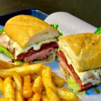 The Deuce  · 2 oz. of pastrami 2 oz. black forest ham, 2 pieces and bacon, 2 sliced of melted provolone c...