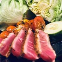 Ahi Wedge  · Ahi tuna blackened served with sauteed cherry tomatoes and avocado served with teriyaki and ...