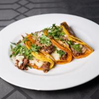 Quesabirria Trio · 3 small quesadillas made with Monterrey Jack cheese  Birria meat, fresh onions, cilantro red...