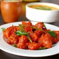 Paneer 65 · Stir fried cottage cheese cubes in yogurt and indian spices with ginger, garlic and curry le...