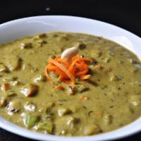 Nizami Handi · Assorted veggies cooked in Creamy spinach sauce. Served with rice.