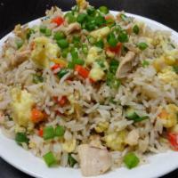 Chicken Fried Rice · Stir fried rice in chicken, egg and veggies with spices.