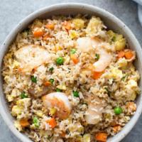 Mixed Fried Rice · Stir fried rice in shrimp, chicken, egg and veggies with delicious Indochinese spices.