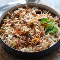 Lamb Kheema Biryani · Ground lamb and rice cooked with rich aromatic spices and fried onion.