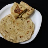 Chapathi ·  A round flat unleavened bread of India that is usually made of whole wheat flour and cooked...