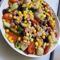 Large mixed salad · Romaine lettuce, chopped tomatoes, cucumbers, beets, tuna, carrots, potatoes, sweet corn wit...