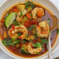 Shrimp Soup/ Sopa de Camarones · Shrimp Soup is accompanied by slices of bread and a side of rice.