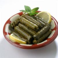 Grape Leaves · Stuffed with rice, parsley, onions, tomatoes, olive oil and lemon juice.