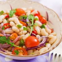 White Bean Salad  · Piyaz. Beans mixed with cnocoa onions, tomatoes, peppers, parsley, olive oil, lemon juice an...