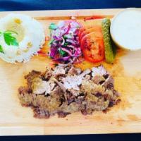 Mr Gyro Plater · Served with rice, onions, tomatoes, parsley and cacik sauce, pickled.