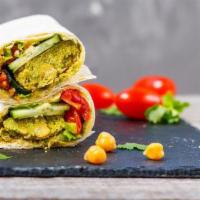 Falafel Wrap  · Lettuce, tomatoes, onions, and tahini sauce comes with humus. 
