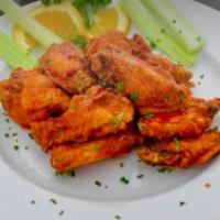 Wings Wrap  · 10 pieces. Mild or hot. Served with french fries, celery and blue cheese.